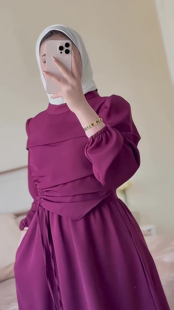 F34 A dress with a unique design 