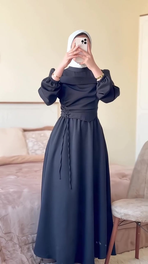 F34 A dress with a unique design 