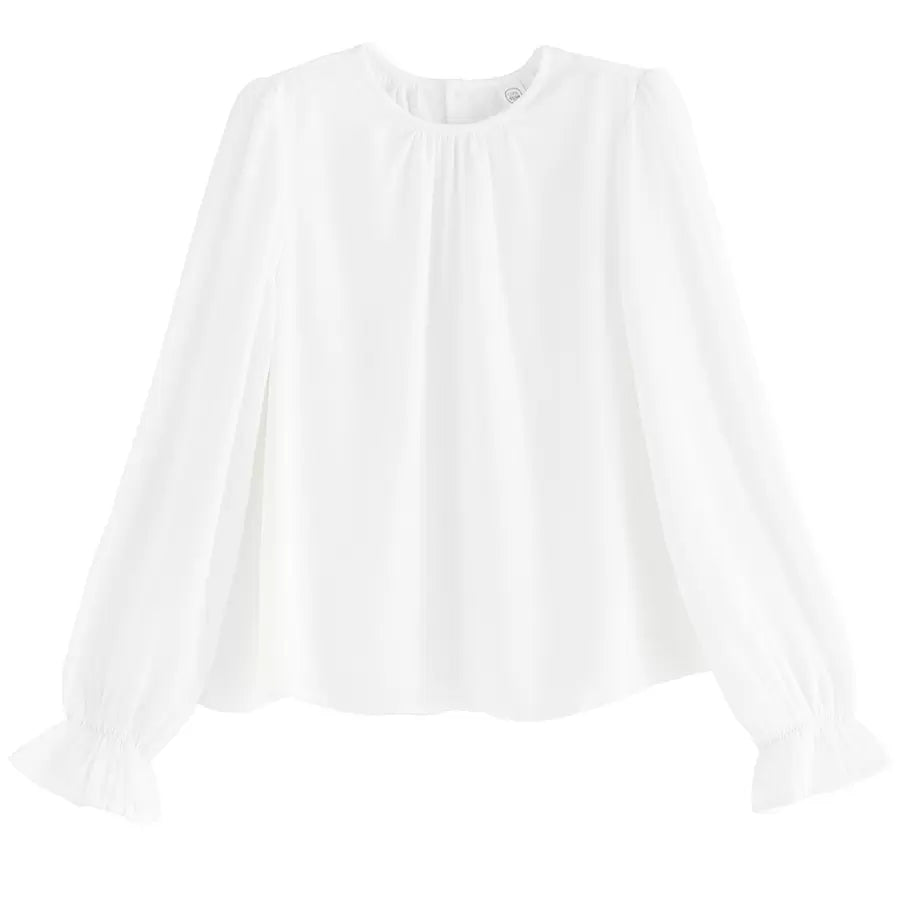 A white blouse with a unique design